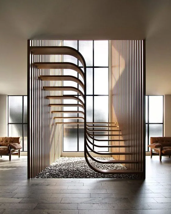 Sculptural feature staircase and timber joinery — Royal Fitout & Interior Design project, Dubai